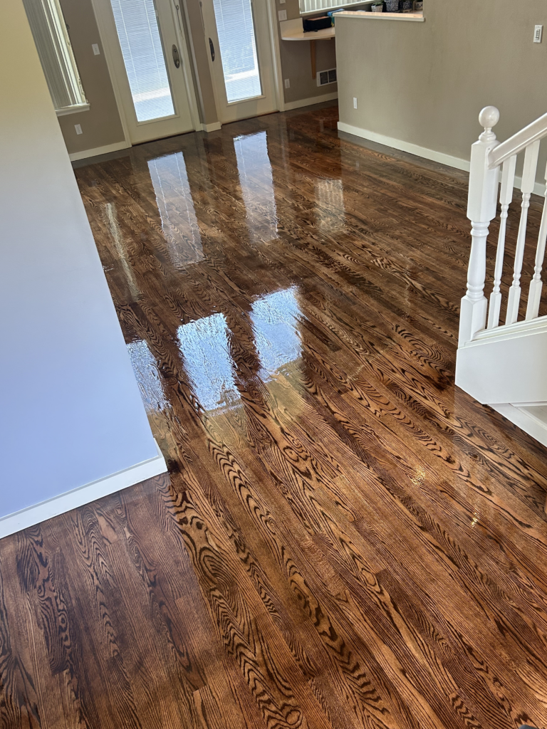 refinished hardwood floor in hallway of Bellevue, WA home