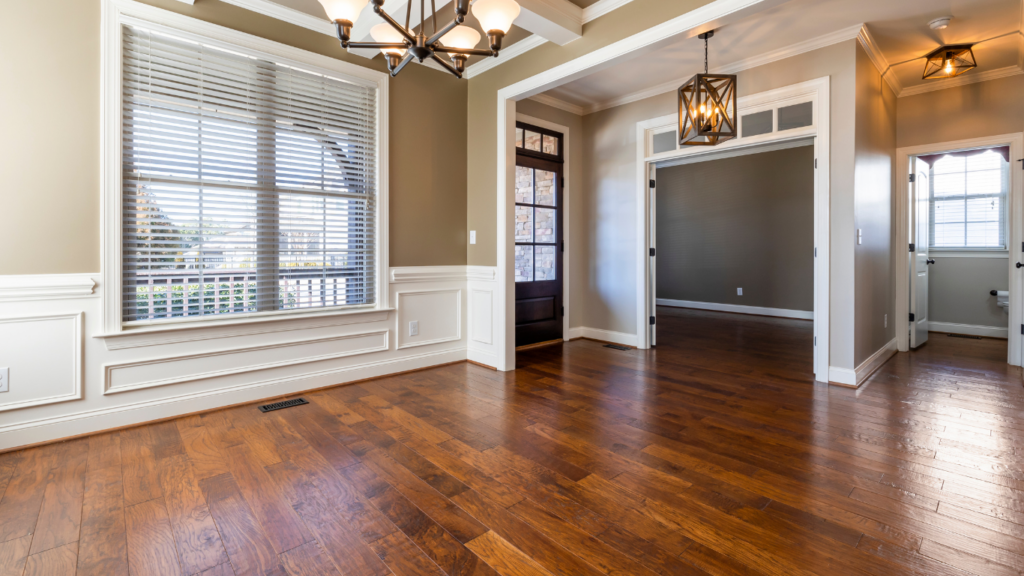 Refinished hardwood floor in living room of Bellevue, WA home