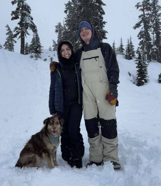 Jeff Family Picture Couple in snow with dog